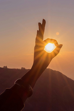 hand holding sun