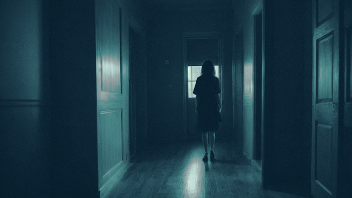 Dark woman house blue